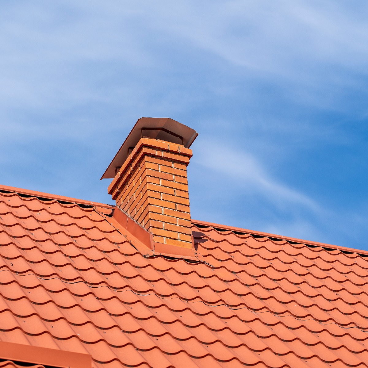 chimney on Spanish tile roof